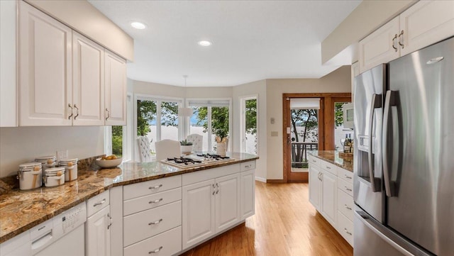 7420 Long Lake Rd, Dovre Twp, MN 56201 - kitchen with white appliances, white cabinetry, recessed lighting, light wood-style floors, and a peninsula