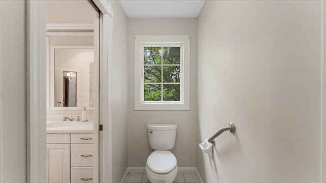 7420 Long Lake Rd, Dovre Twp, MN 56201 - half bathroom with vanity, toilet, baseboards, and tile patterned floors