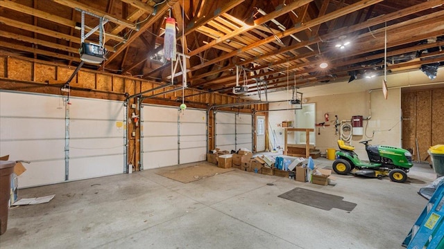 7420 Long Lake Rd, Dovre Twp, MN 56201 - garage featuring a garage door opener