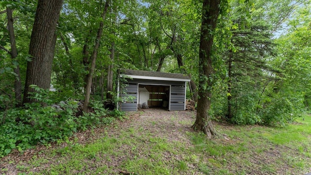 7420 Long Lake Rd, Dovre Twp, MN 56201 - view of shed with a forest view