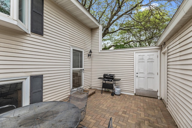 8847 Ironwood Ave S, Cottage Grove, MN 55016 - view of patio featuring a grill and outdoor dining area