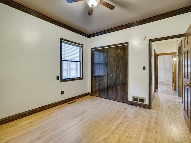 1396 Palace Ave, Saint Paul, MN 55105 - empty room featuring crown molding, light wood-type flooring, a ceiling fan, and baseboards
