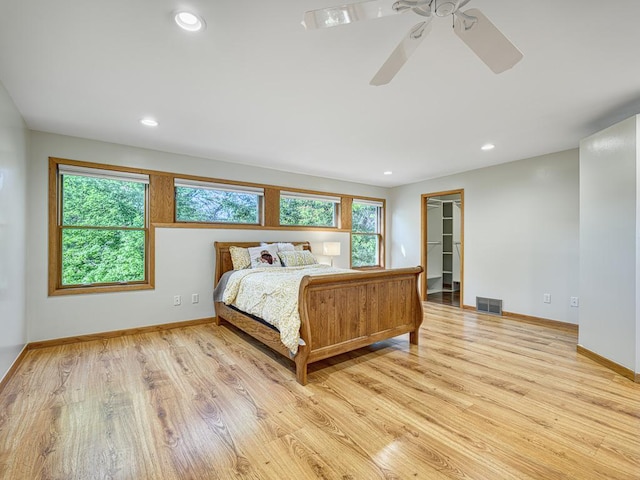 1396 Palace Ave, Saint Paul, MN 55105 - bedroom featuring light wood-style flooring, baseboards, recessed lighting, a ceiling fan, and a spacious closet