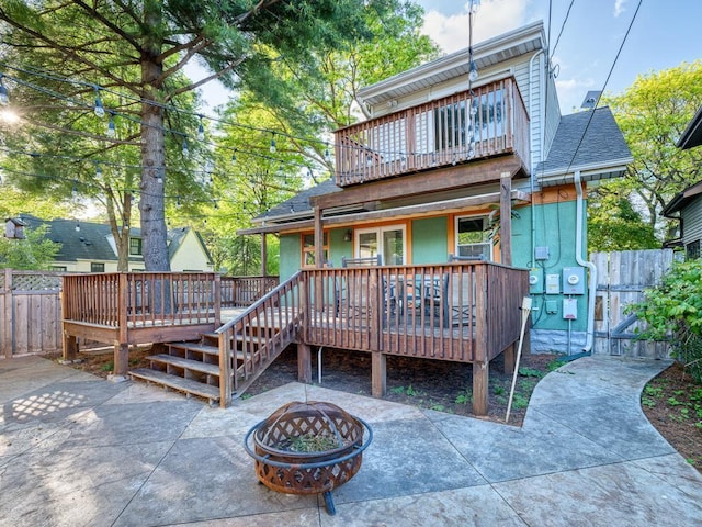 1396 Palace Ave, Saint Paul, MN 55105 - back of house featuring an outdoor fire pit, a porch, a patio area, and a shingled roof