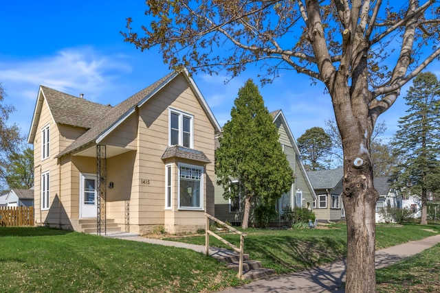 1415 Wynne Ave, Saint Paul, MN 55108 - traditional home featuring a shingled roof
