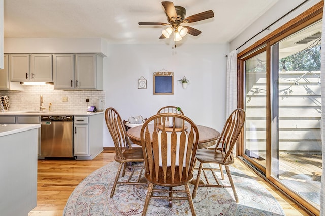3948 Orchid Ln N, Plymouth, MN 55446 - dining room with light wood finished floors and a ceiling fan
