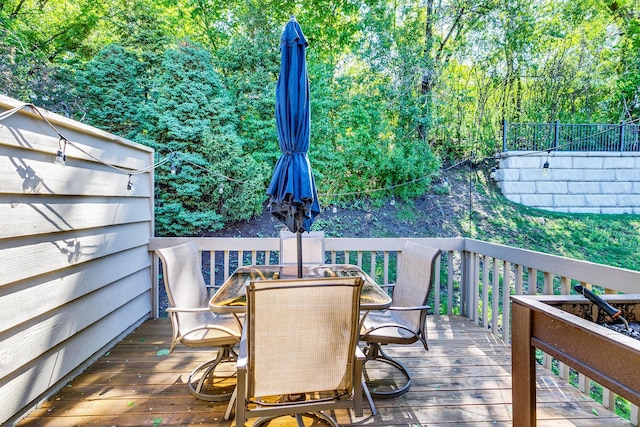 3948 Orchid Ln N, Plymouth, MN 55446 - wooden terrace with outdoor dining area