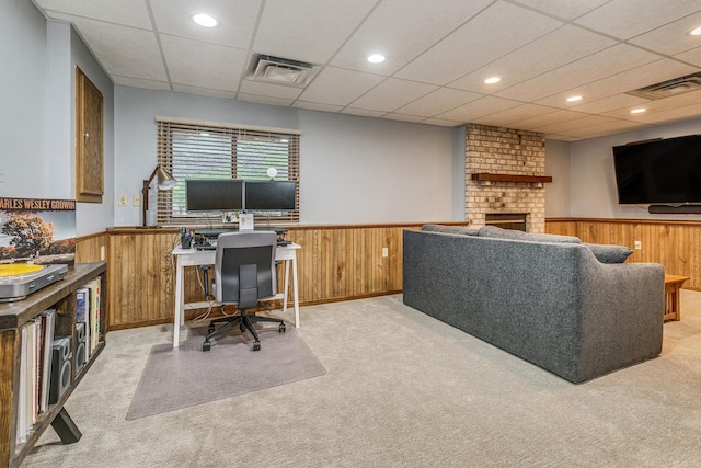 3948 Orchid Ln N, Plymouth, MN 55446 - office featuring carpet flooring, a wainscoted wall, a brick fireplace, wooden walls, and a drop ceiling