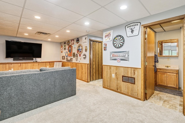 3948 Orchid Ln N, Plymouth, MN 55446 - living area featuring wainscoting, wooden walls, recessed lighting, a paneled ceiling, and light carpet