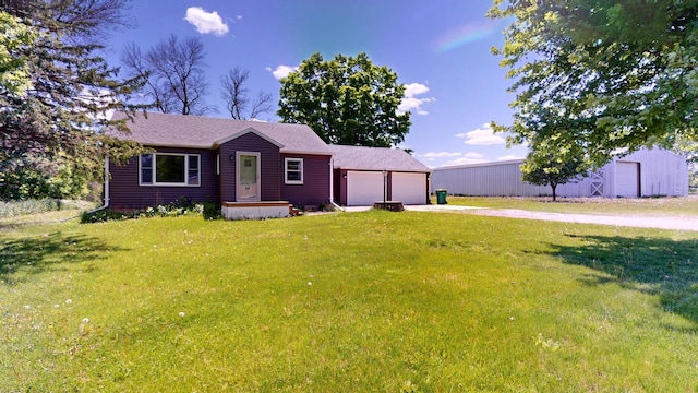 706 19th St, Albert Lea, MN 56007 - view of front of property with driveway, a front yard, roof with shingles, and an attached garage