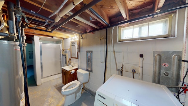 706 19th St, Albert Lea, MN 56007 - below grade area featuring water heater, washer / clothes dryer, and concrete block wall
