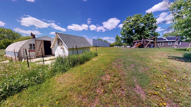 706 19th St, Albert Lea, MN 56007 - view of grassy yard with an outbuilding