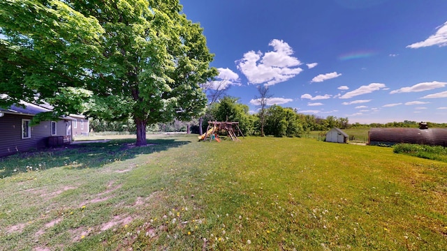 706 19th St, Albert Lea, MN 56007 - view of green lawn with a playground