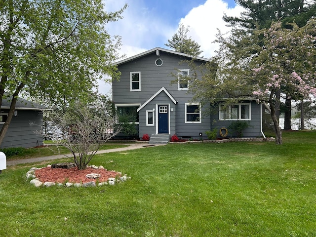 100 8th Ave, Grand Rapids, MN 55744 - view of front facade with a front yard
