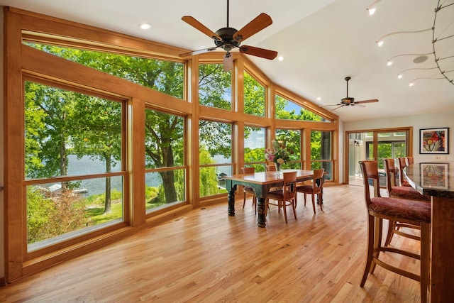 4080 Lotus Dr, Minnetrista, MN 55331 - dining space with a ceiling fan, high vaulted ceiling, light wood-style flooring, recessed lighting, and a water view