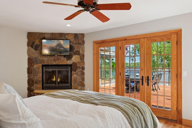4080 Lotus Dr, Minnetrista, MN 55331 - bedroom with access to outside, multiple windows, french doors, wood finished floors, and recessed lighting