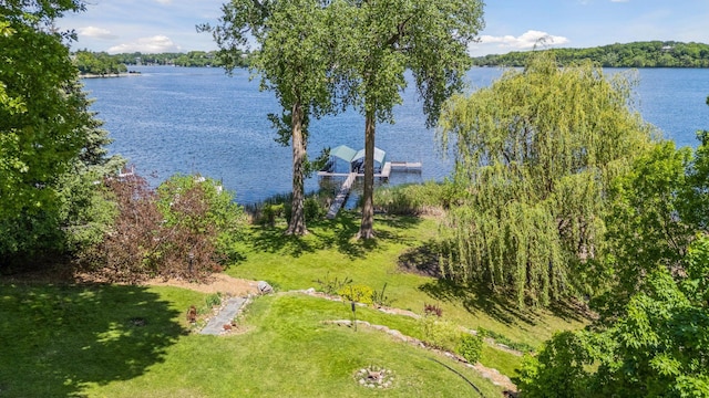 4080 Lotus Dr, Minnetrista, MN 55331 - water view featuring boat lift and a dock