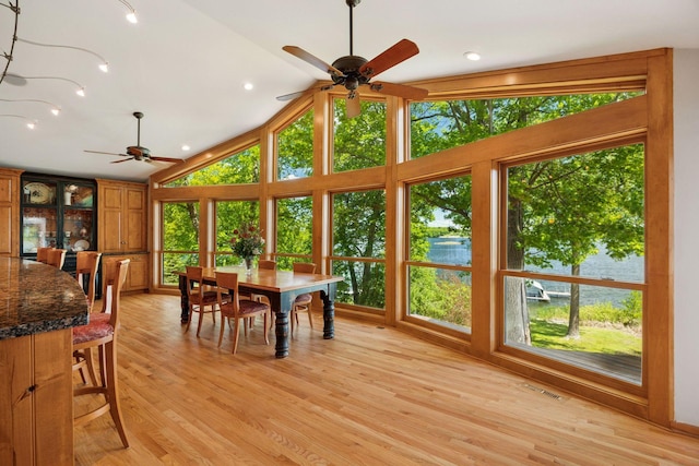 4080 Lotus Dr, Minnetrista, MN 55331 - dining area featuring ceiling fan, lofted ceiling, light wood-type flooring, and recessed lighting