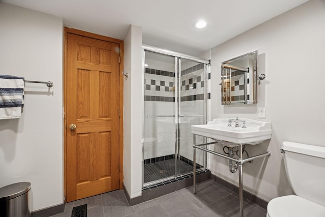 4080 Lotus Dr, Minnetrista, MN 55331 - full bathroom with toilet, a shower stall, tile patterned floors, recessed lighting, and baseboards