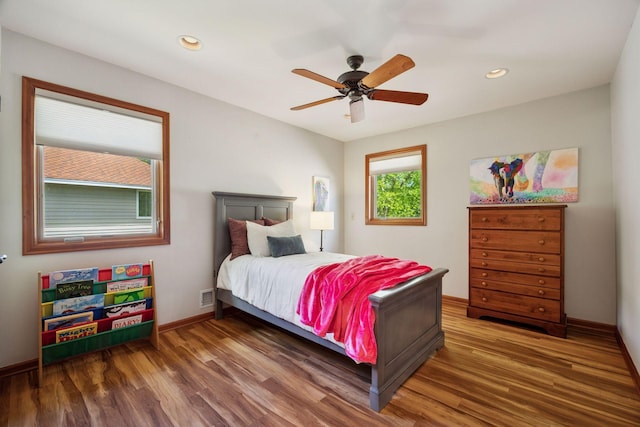 4080 Lotus Dr, Minnetrista, MN 55331 - bedroom with wood finished floors, baseboards, recessed lighting, and ceiling fan