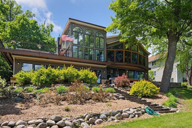4080 Lotus Dr, Minnetrista, MN 55331 - rear view of property featuring a sunroom