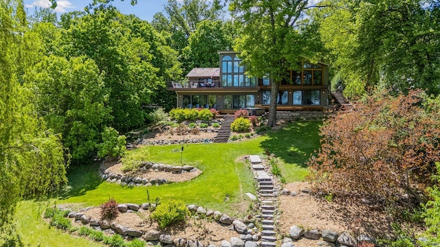 4080 Lotus Dr, Minnetrista, MN 55331 - view of grassy yard with stairway and a deck