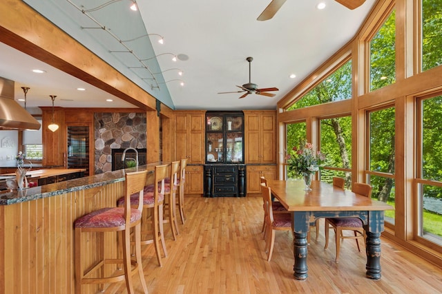 4080 Lotus Dr, Minnetrista, MN 55331 - dining space featuring a ceiling fan, plenty of natural light, light wood-style flooring, vaulted ceiling, and recessed lighting