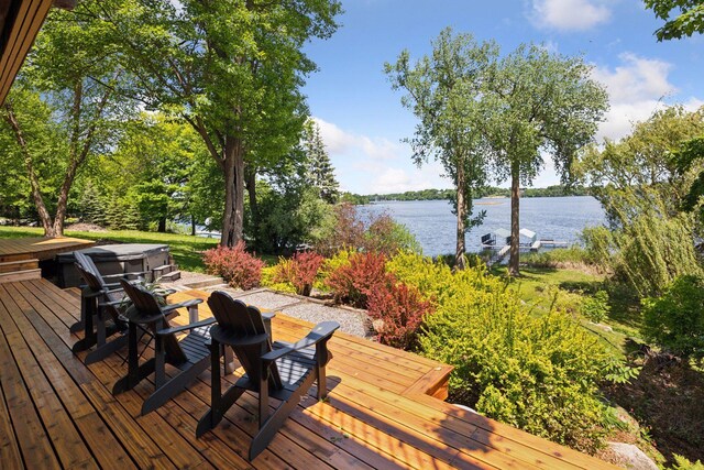 4080 Lotus Dr, Minnetrista, MN 55331 - wooden terrace with a water view