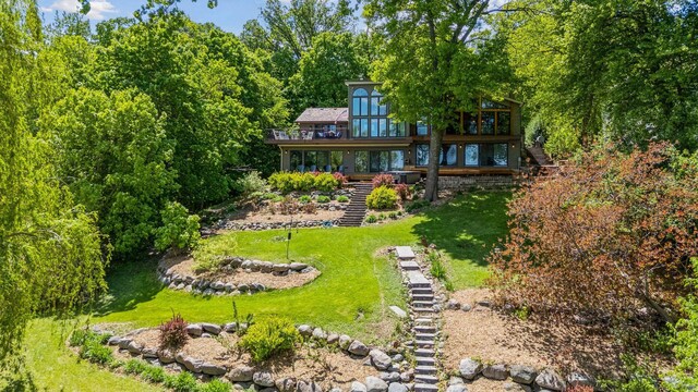 4080 Lotus Dr, Minnetrista, MN 55331 - view of green lawn featuring stairway and a wooden deck