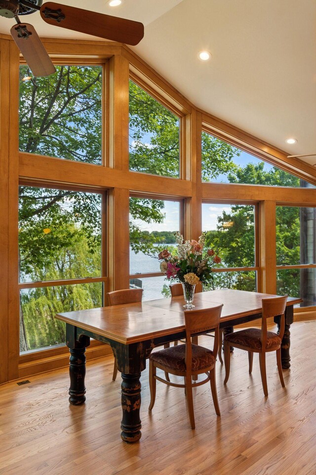 4080 Lotus Dr, Minnetrista, MN 55331 - dining area with vaulted ceiling, healthy amount of natural light, light wood finished floors, and recessed lighting