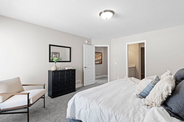2135 Violet Ln, Faribault, MN 55021 - carpeted bedroom featuring baseboards and ensuite bath