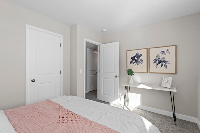 2135 Violet Ln, Faribault, MN 55021 - carpeted bedroom featuring baseboards
