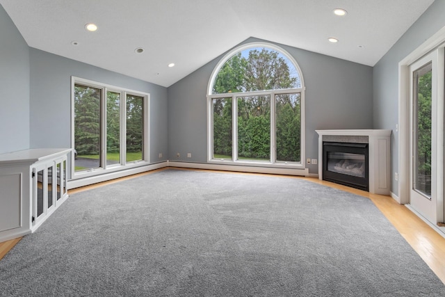 1901 Lexington Ave S, Mendota Heights, MN 55118 - unfurnished living room featuring vaulted ceiling, healthy amount of natural light, light wood finished floors, a fireplace, and recessed lighting