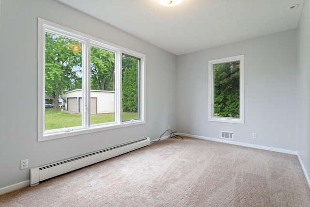 1901 Lexington Ave S, Mendota Heights, MN 55118 - carpeted spare room featuring a baseboard radiator and baseboards