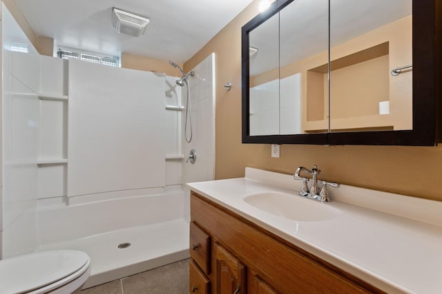 1901 Lexington Ave S, Mendota Heights, MN 55118 - bathroom featuring toilet, vanity, and tile patterned floors