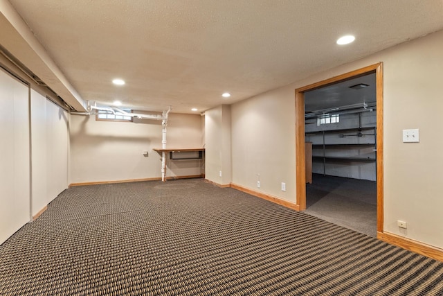 1901 Lexington Ave S, Mendota Heights, MN 55118 - finished below grade area featuring carpet floors, recessed lighting, and baseboards