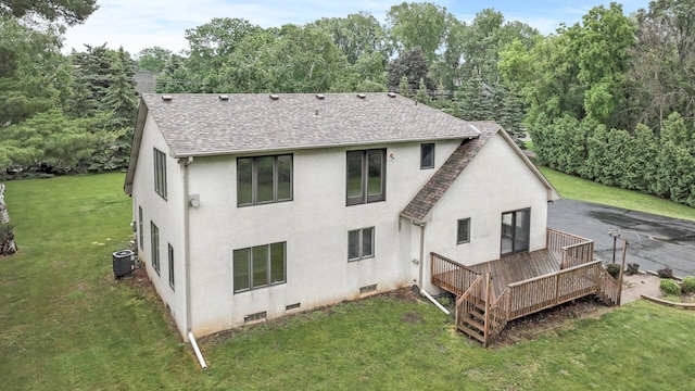 1901 Lexington Ave S, Mendota Heights, MN 55118 - back of property with roof with shingles, central AC unit, stucco siding, a yard, and a wooden deck