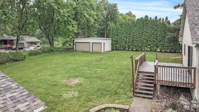 1901 Lexington Ave S, Mendota Heights, MN 55118 - view of green lawn with a deck, an outdoor structure, a detached garage, and stairs
