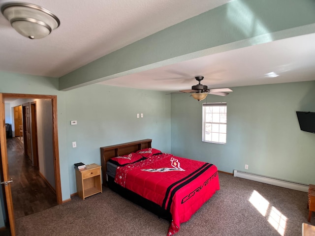 10306 Hemlock St NW, Annandale, MN 55302 - carpeted bedroom featuring a baseboard heating unit, ceiling fan, and baseboards