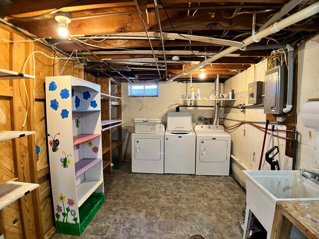 10306 Hemlock St NW, Annandale, MN 55302 - basement with a sink, washing machine and clothes dryer, and electric panel