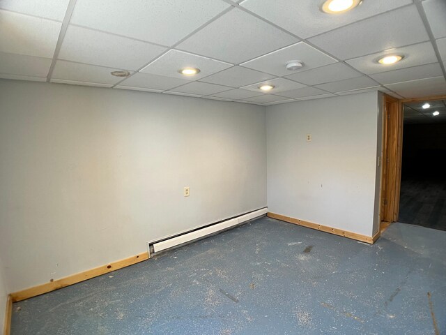 10306 Hemlock St NW, Annandale, MN 55302 - spare room featuring baseboards, a baseboard radiator, recessed lighting, a paneled ceiling, and a smoke detector