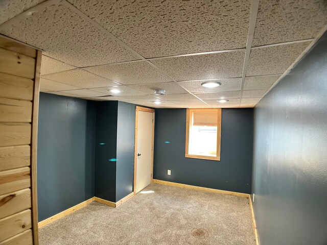 10306 Hemlock St NW, Annandale, MN 55302 - basement featuring carpet flooring, baseboards, and a drop ceiling