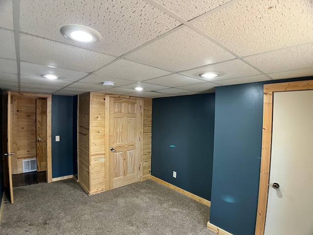 10306 Hemlock St NW, Annandale, MN 55302 - finished below grade area with carpet, baseboards, a paneled ceiling, and recessed lighting