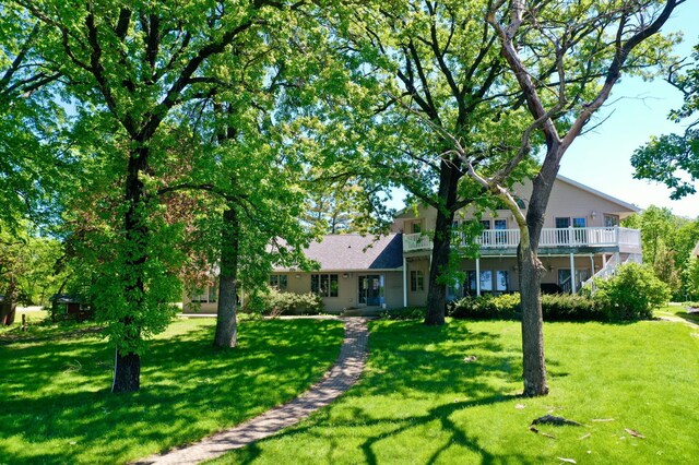 5386 165th St NE, Atwater, MN 56209 - view of green lawn featuring a wooden deck