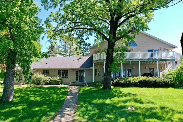 5386 165th St NE, Atwater, MN 56209 - view of front of house with a front yard and a wooden deck