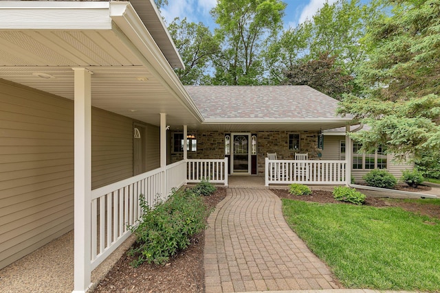 5386 165th St NE, Atwater, MN 56209 - doorway to property with covered porch and roof with shingles