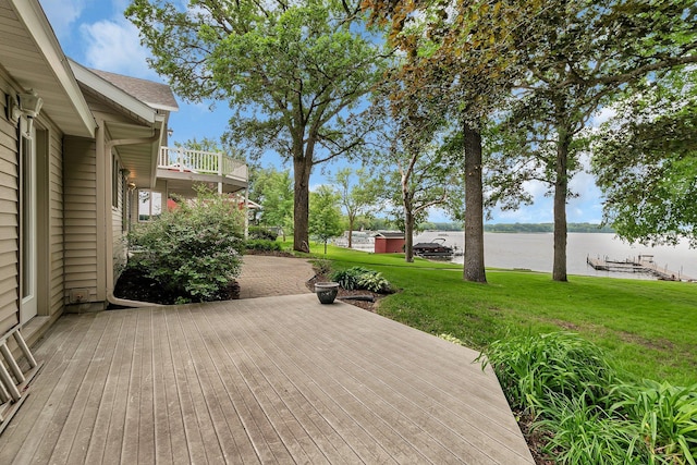 5386 165th St NE, Atwater, MN 56209 - wooden deck featuring a water view and a lawn