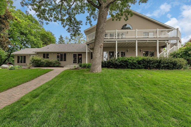 5386 165th St NE, Atwater, MN 56209 - view of front of house with a front yard and a deck