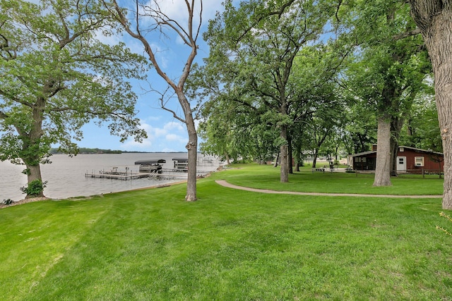 5386 165th St NE, Atwater, MN 56209 - view of grassy yard featuring a dock and a water view