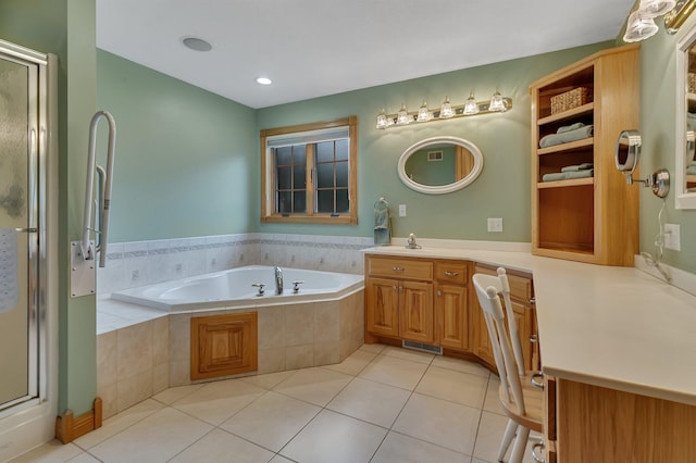 5386 165th St NE, Atwater, MN 56209 - full bathroom with vanity, a garden tub, a shower stall, and tile patterned flooring